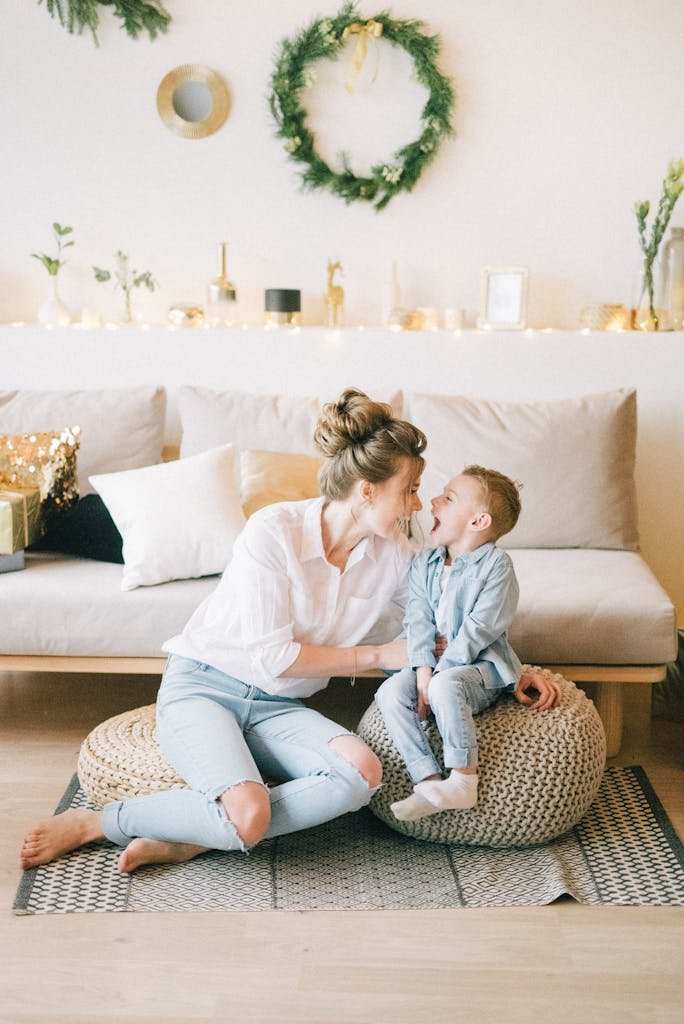 Happy mother and son bonding indoors with stylish decor. Perfect family moments captured.